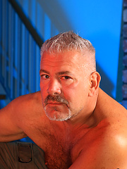 Older gay man demonstrates his hard dick