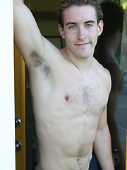 Cute frat jock posing outdoors