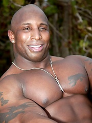 Ebony bodybuilder outdoors