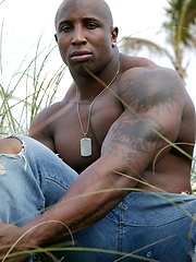 Ebony bodybuilder outdoors