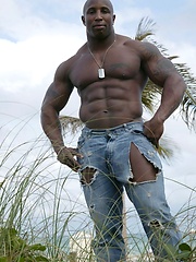 Ebony bodybuilder outdoors