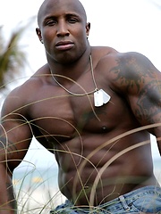 Ebony bodybuilder outdoors