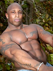 Ebony bodybuilder outdoors