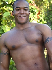 Young black stud demonstrates his athletic body