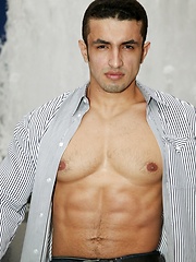 Brunette guy showing his perfect latin body