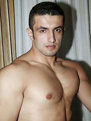 Brunette guy showing his perfect latin body