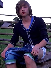 Emo boy toying in the evening