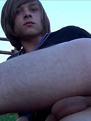 Emo boy toying in the evening