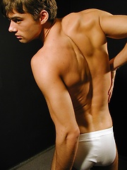 Super fit Jim Woods tugging on his hard cock.