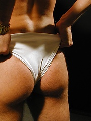 Super fit Jim Woods tugging on his hard cock.