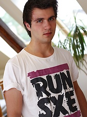 Sexy Justin Walker busts a nut over his hairy stomach.