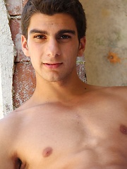 Athletic stud Maxim Moira strips butt naked outdoors.