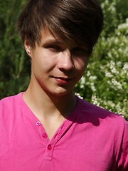 Cute boy Desmond Hall busts a nut in the backyard.