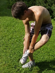 Cute boy Desmond Hall busts a nut in the backyard.