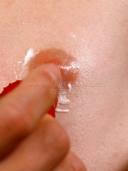 Nude Charles plays with strawberry